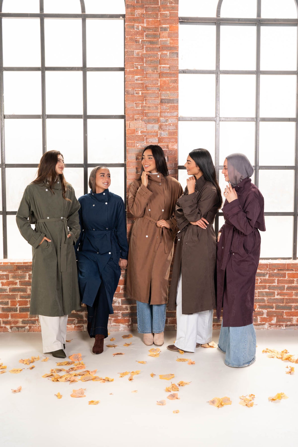 Chiffon Winter 27: full length group styling in five winter coat colours.